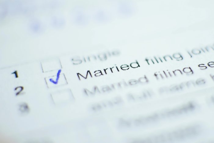 Tax Filing Status: Married Filing Separately vs. Married Filing Jointly – Consequences for Green Card Holders